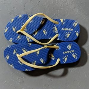Brand new size 8 Old Navy Flip Flops with suns